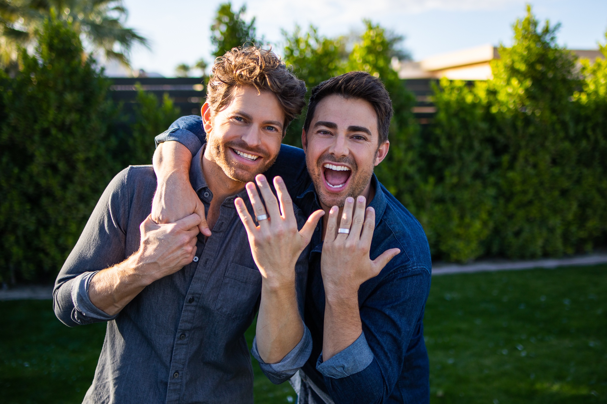 LGBTQ+ Weddings - Proud Fox Ceremonies, including Drag Queen Weddings. Drag You Up The Aisle. A couple show off their engagement rings.